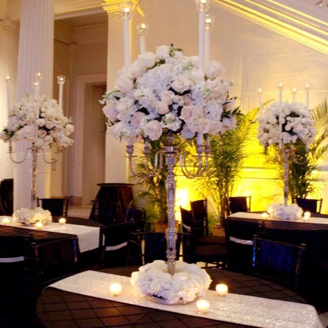 Large white flower arrangements featuring lush blooms and elegant design details