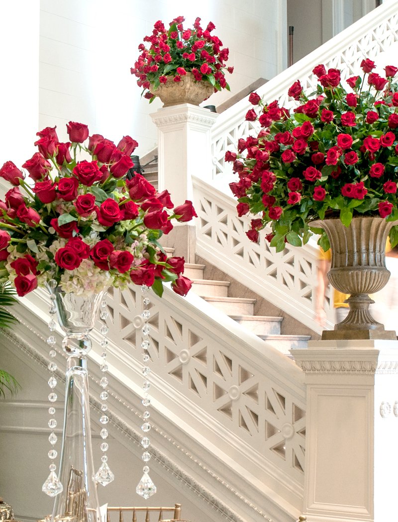 Stunning large rose floral arrangements featuring lush, vibrant blooms