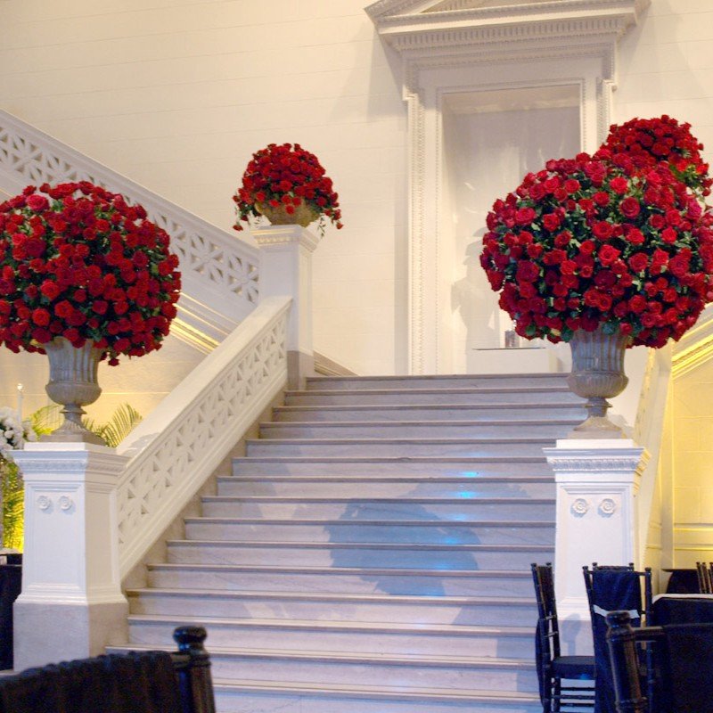 Stunning large rose floral arrangements featuring lush, vibrant blooms.