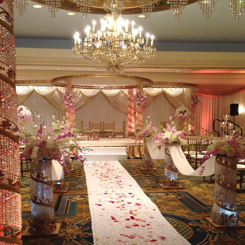 Elegant wedding flower display featuring lush blooms and sophisticated event design details