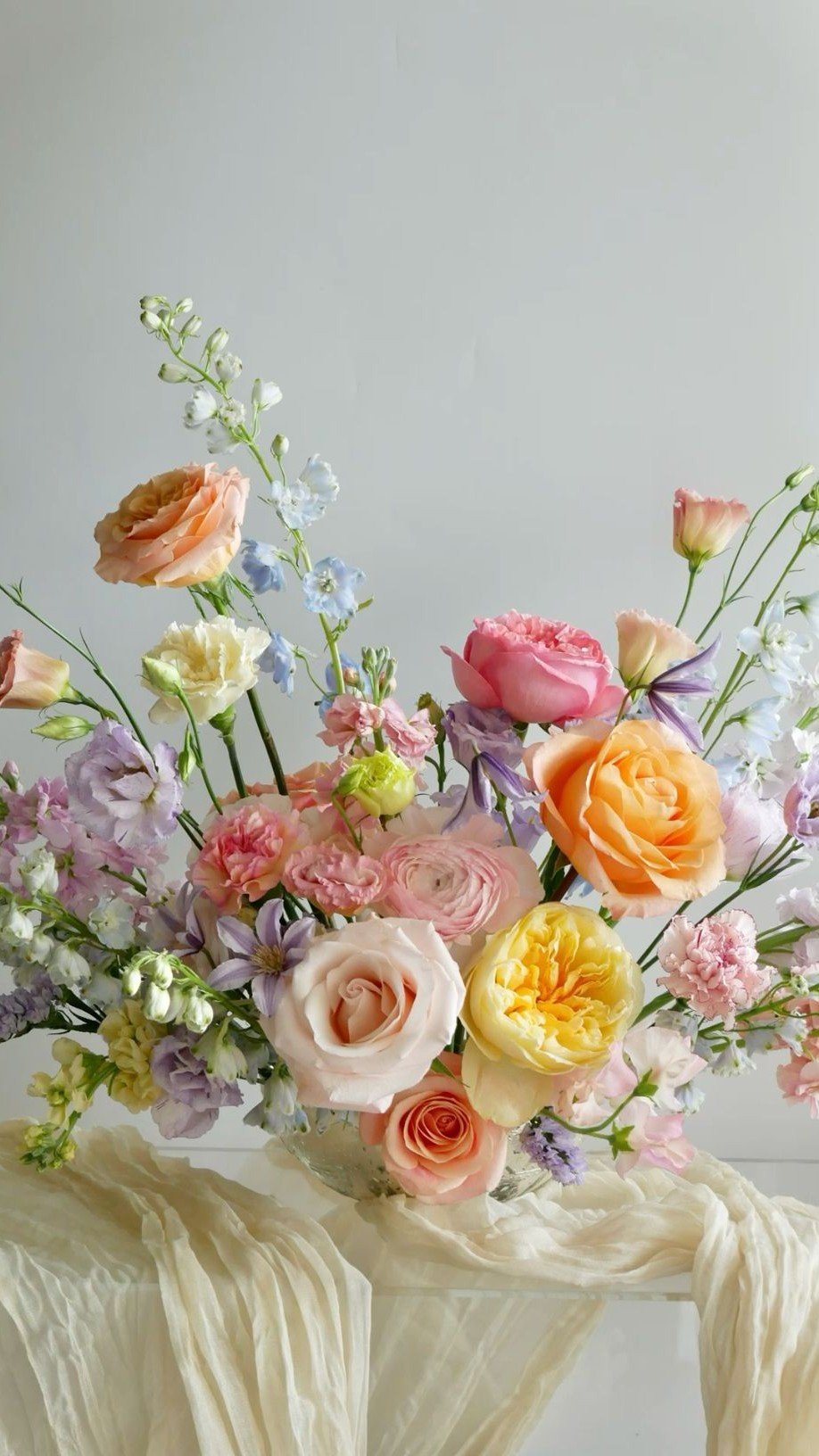 Modern floral arrangement showcasing 2025 flower trends with bold colors, unique textures, and artistic design.