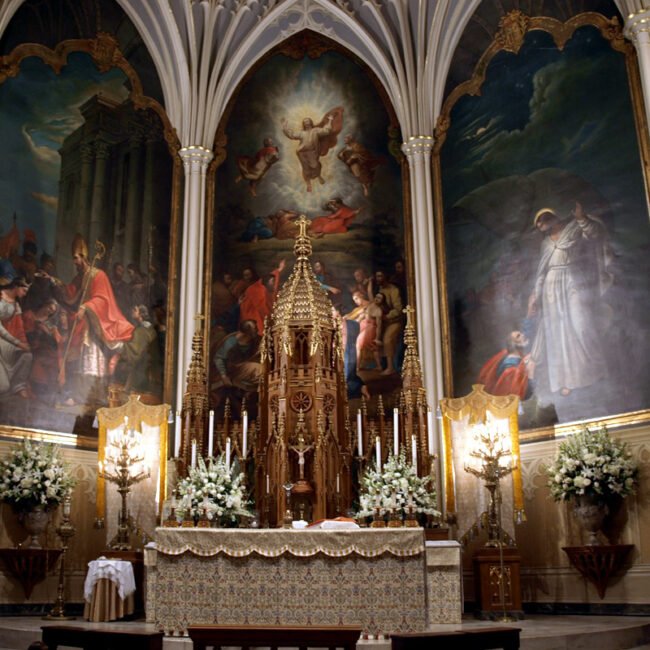 Elegant large flower arrangements decorating the altar of St. Louis Cathedral in New Orleans.