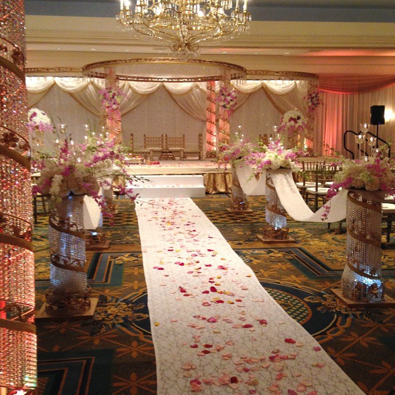 Elegant wedding flower display featuring lush blooms and sophisticated event design details